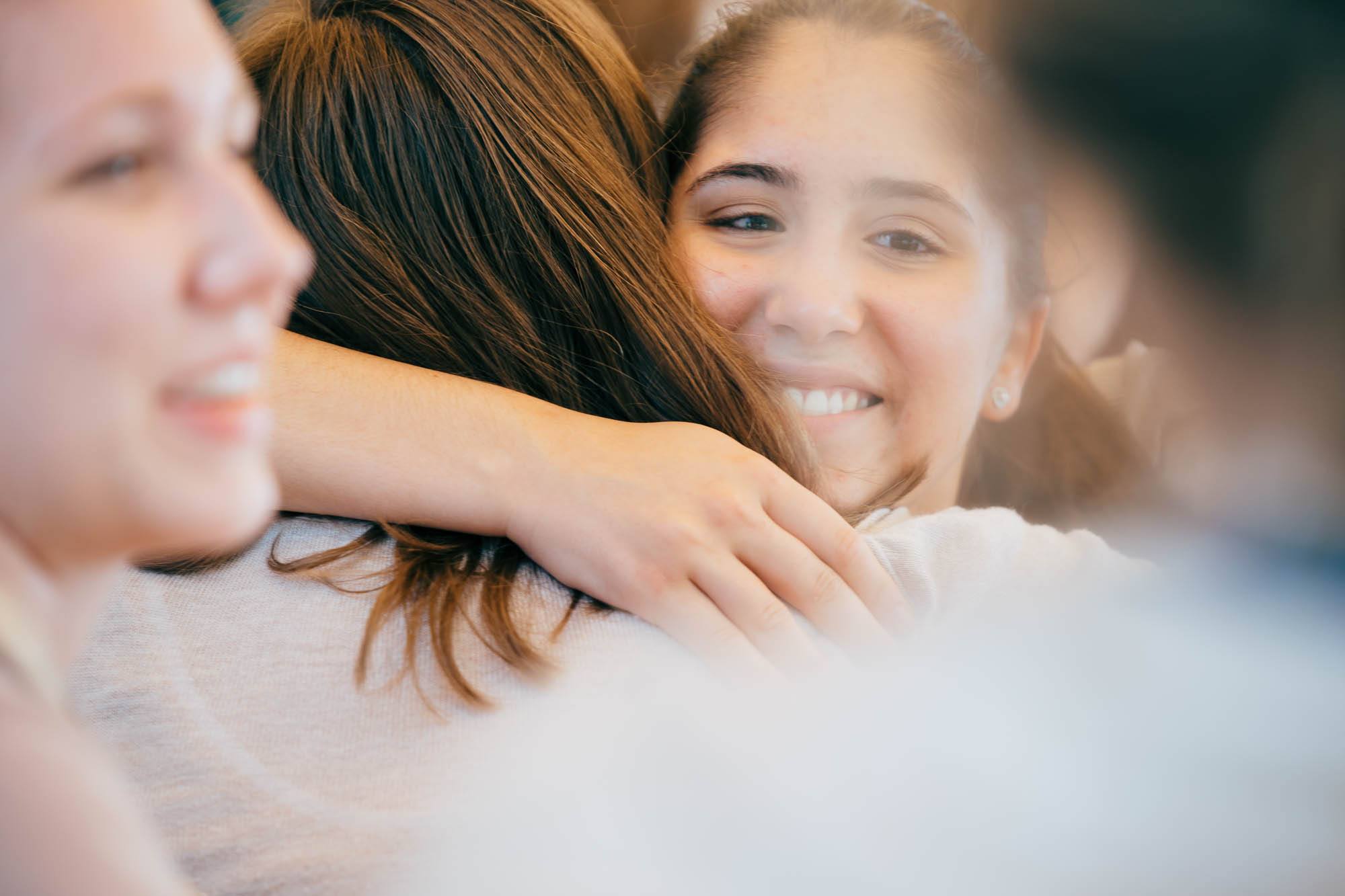 women hugging